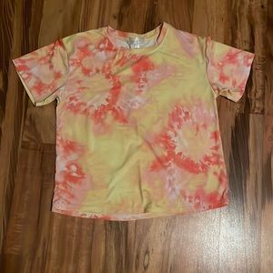 The shirt has a tie dye look to it, girls L, and from Sunset West.